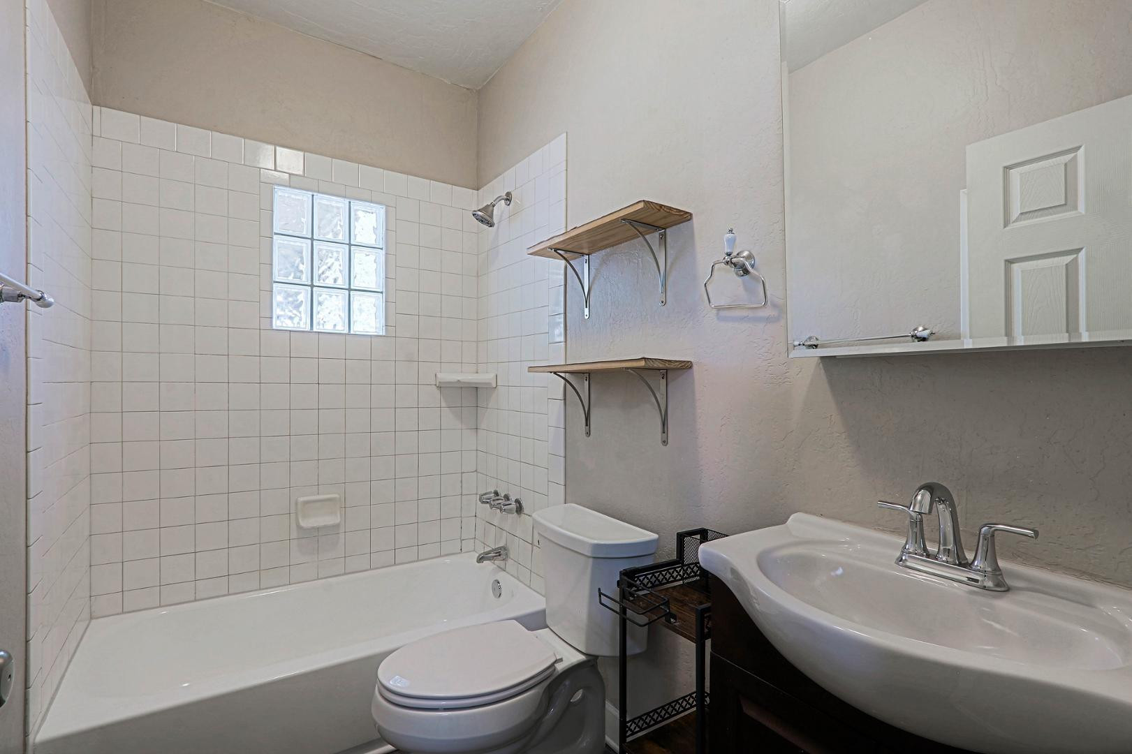 841 North 9th Avenue Phoenix, AZ 85007 - Photo 14 of 21 a bathroom with a sink toilet and shower