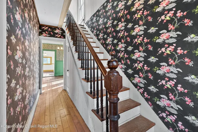 a view of entryway with a front door