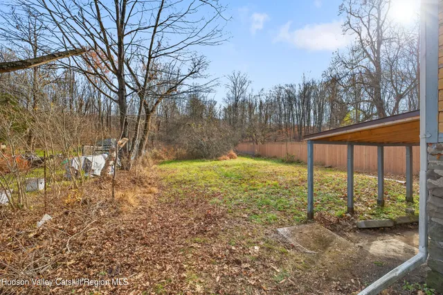 a view of a yard with an outdoor space