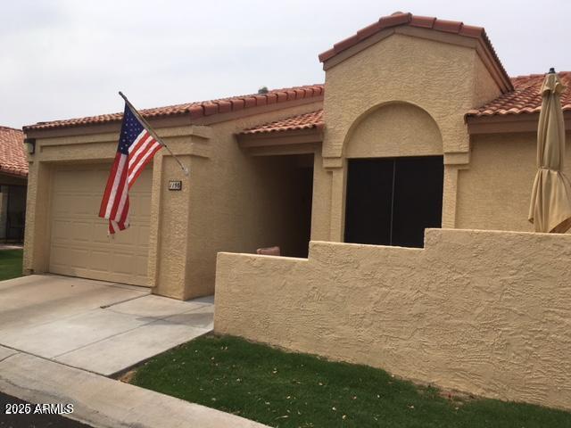 1021 South Greenfield Road, Unit 1198 Mesa, AZ 85206 - Photo 1 of 29 a view of a house with a door