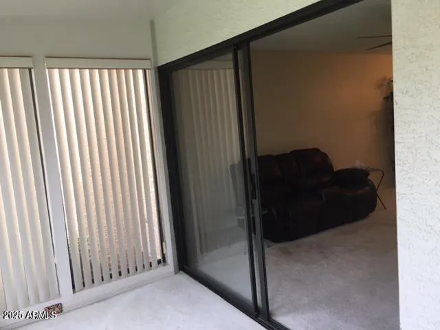 a view of a swimming pool with a lounge chairs