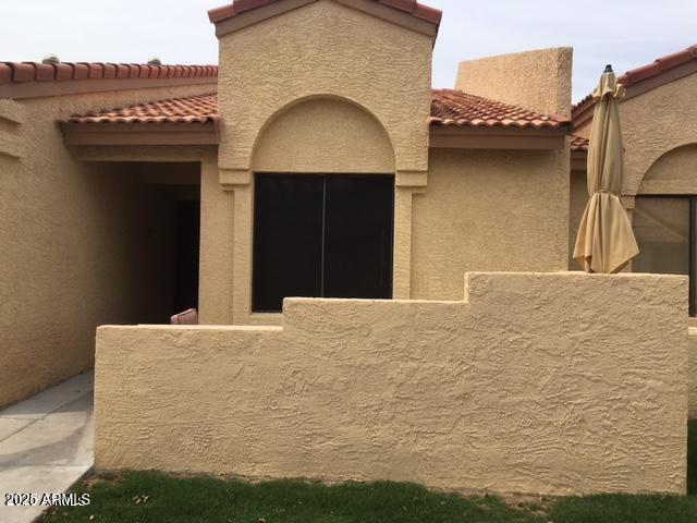 1021 South Greenfield Road, Unit 1198 Mesa, AZ 85206 - Photo 2 of 29 a view of a house with a terrace
