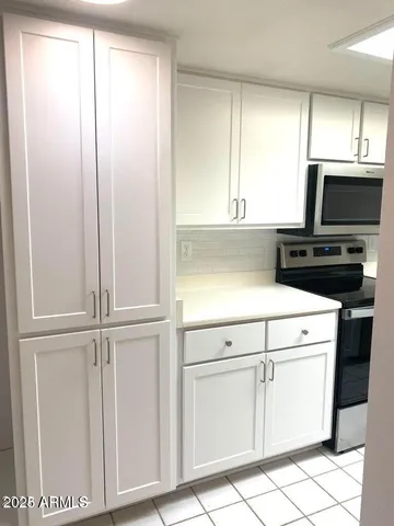 a storage room with washer and dryer