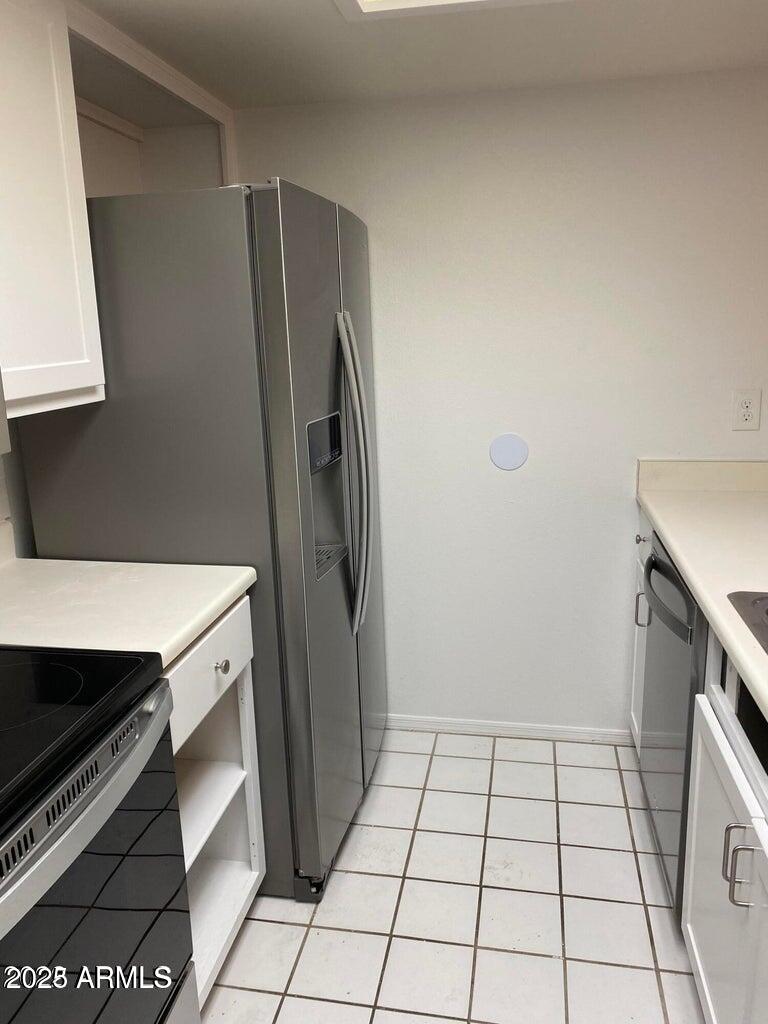 1021 South Greenfield Road, Unit 1198 Mesa, AZ 85206 - Photo 6 of 29 a storage room with washer and dryer