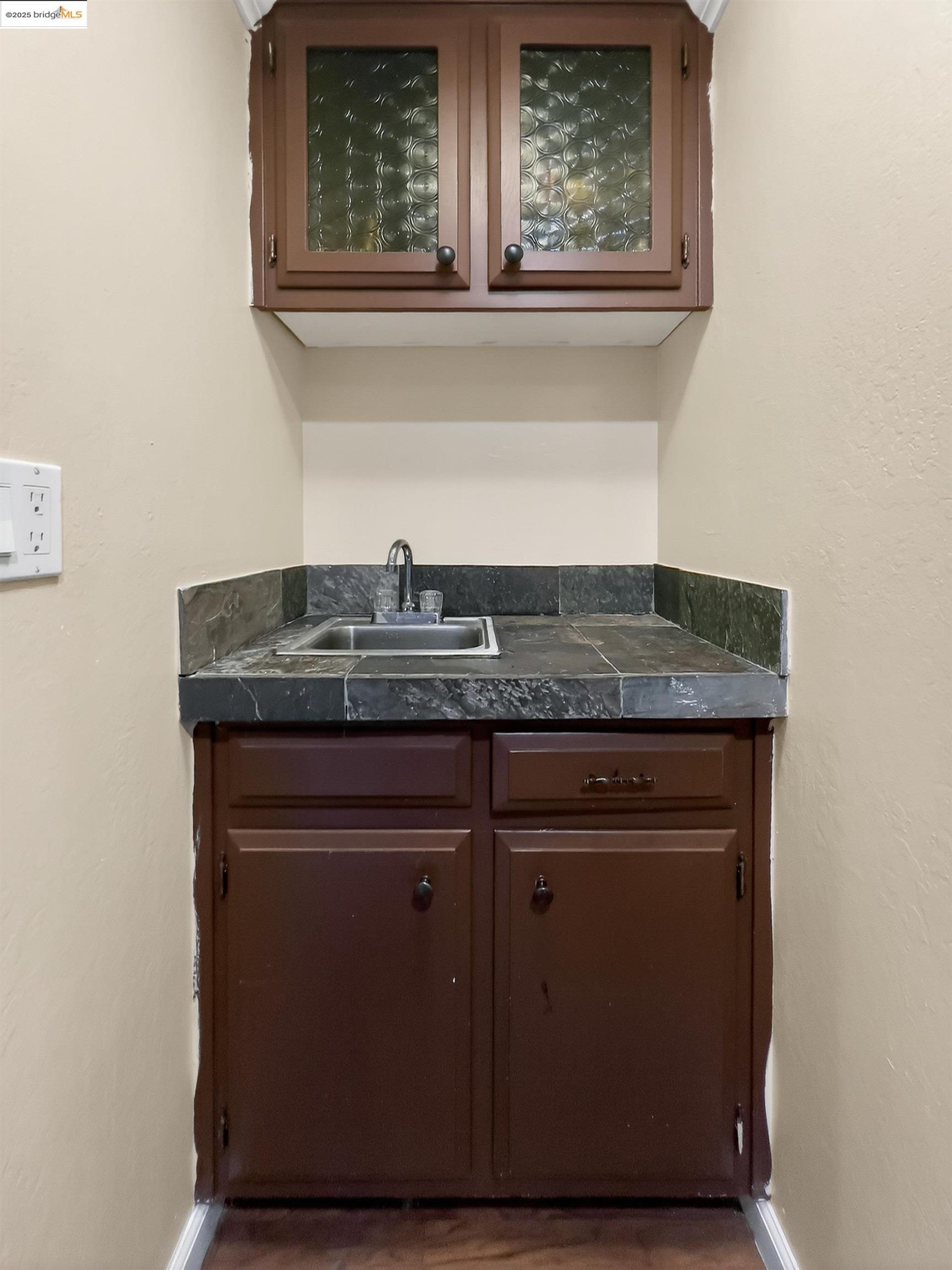 2322 Peachtree Circle Antioch, CA 94509 - Photo 17 of 43 a view of a sink a mirror and cabinets