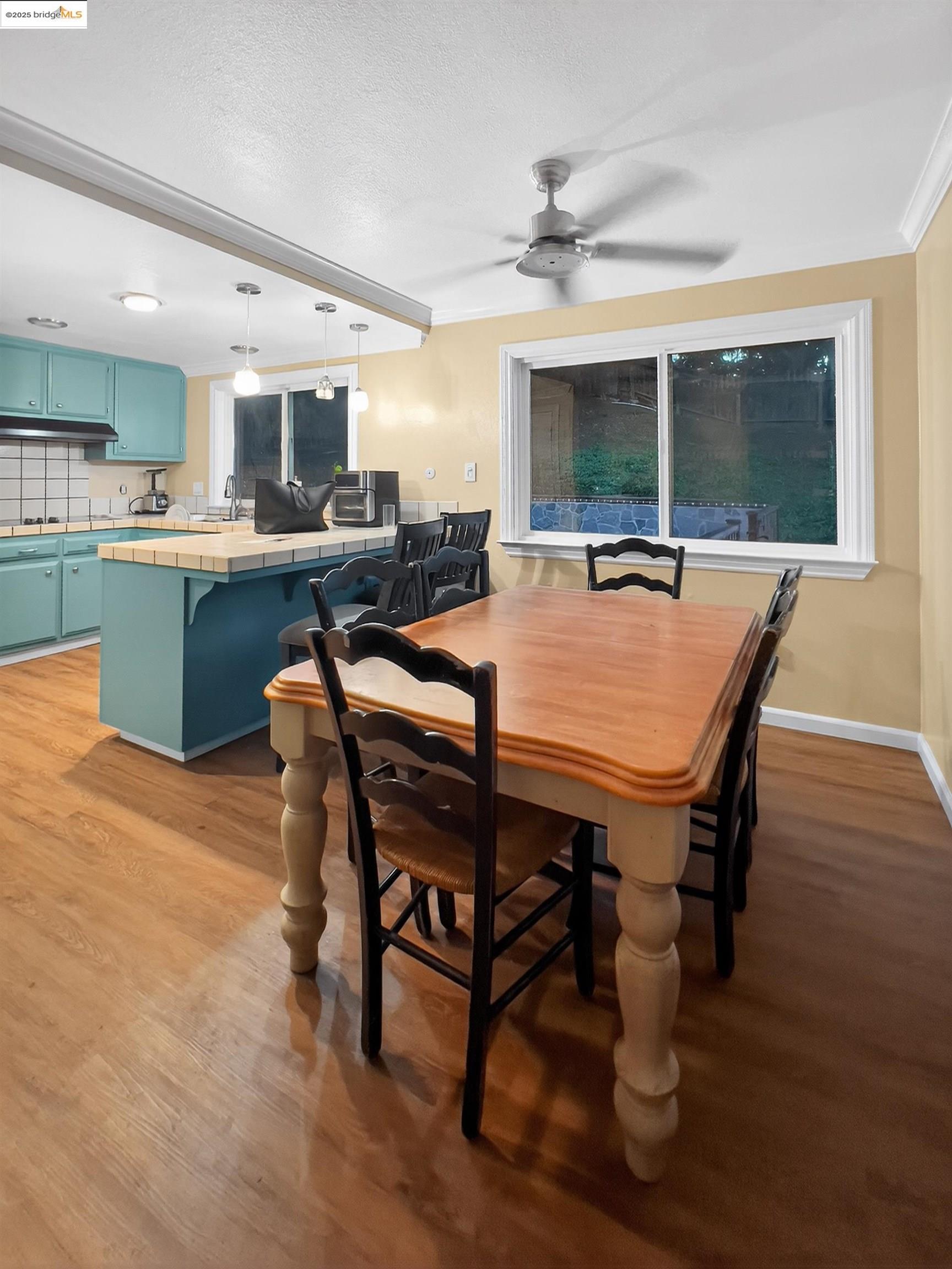 2322 Peachtree Circle Antioch, CA 94509 - Photo 24 of 43 a view of a dining room with furniture window and wooden floor