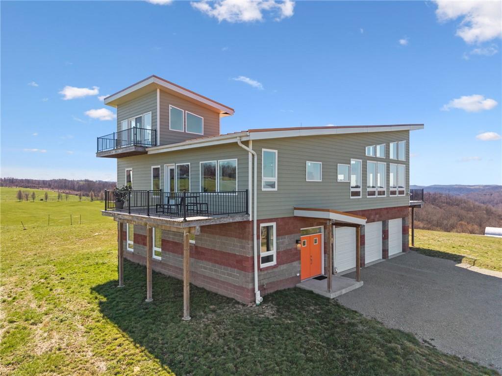 1029 Hoffman Road Smithton, PA 15479 - Photo 42 of 48 a front view of a house with a yard