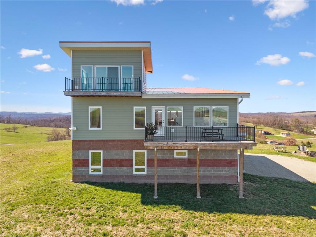 1029 Hoffman Road Smithton, PA 15479 - Photo 45 of 48 a view of a house with a yard