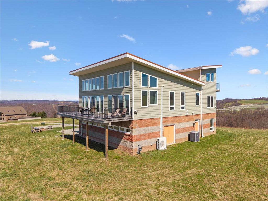 1029 Hoffman Road Smithton, PA 15479 - Photo 47 of 48 a front view of a house with swimming pool