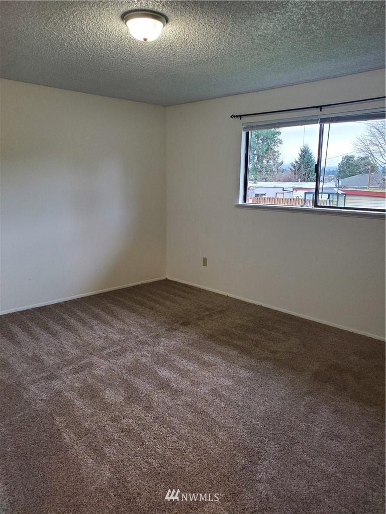 2728 Pine Road Northeast Bremerton, WA 98310 - Photo 17 of 21 a view of empty room with window