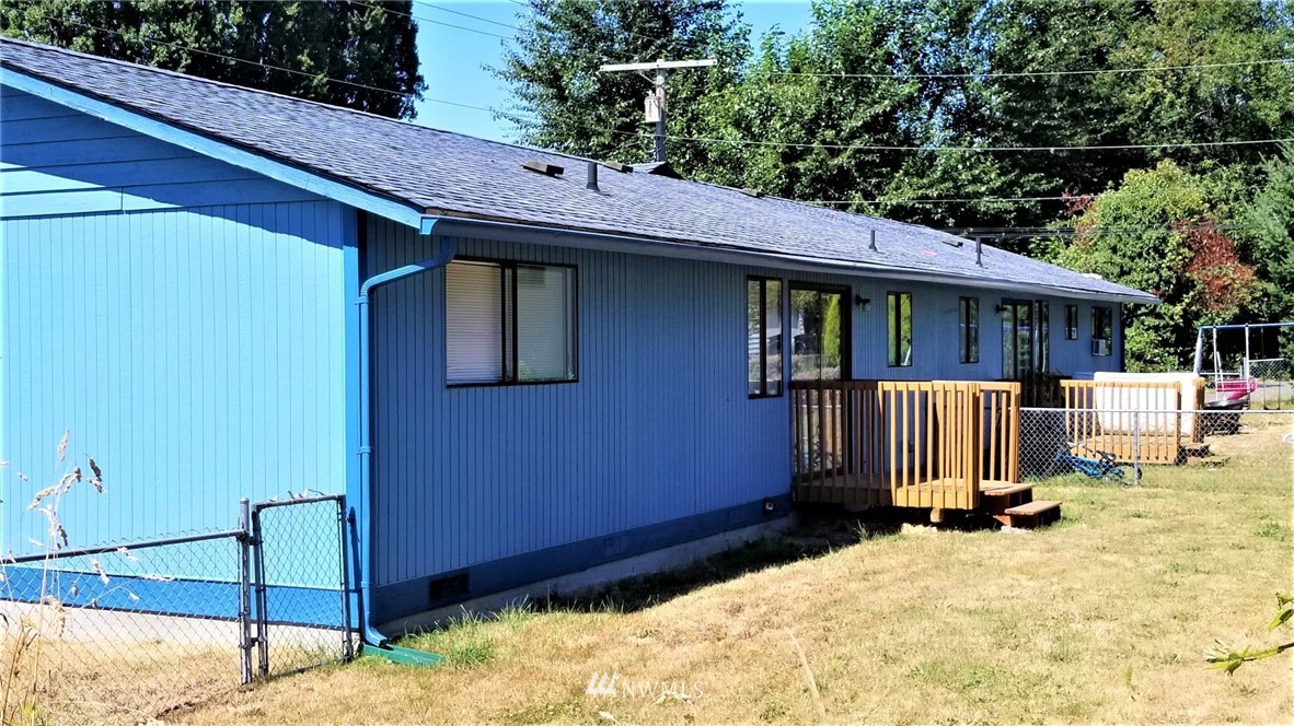 2728 Pine Road Northeast Bremerton, WA 98310 - Photo 5 of 21 a view of a house with wooden fence