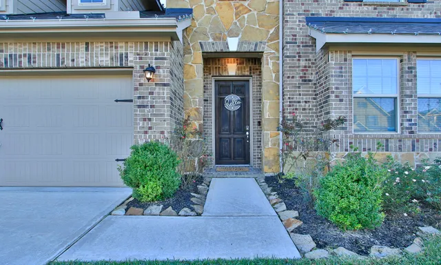 a view of a hallway with living room and furniture