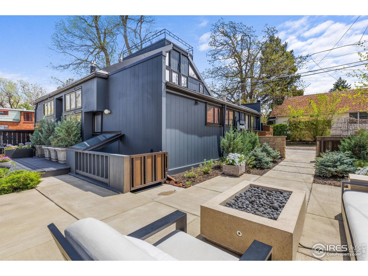 1635 6th Street Boulder, CO 80302 - Photo 30 of 37 a view of a couches on the patio in front of house