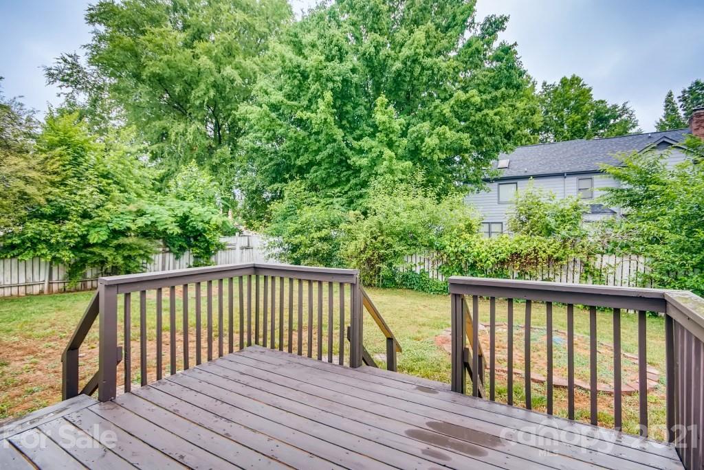 1512 Mineral Springs Road Charlotte, NC 28262 - Photo 19 of 19 a balcony with wooden floor and outdoor space