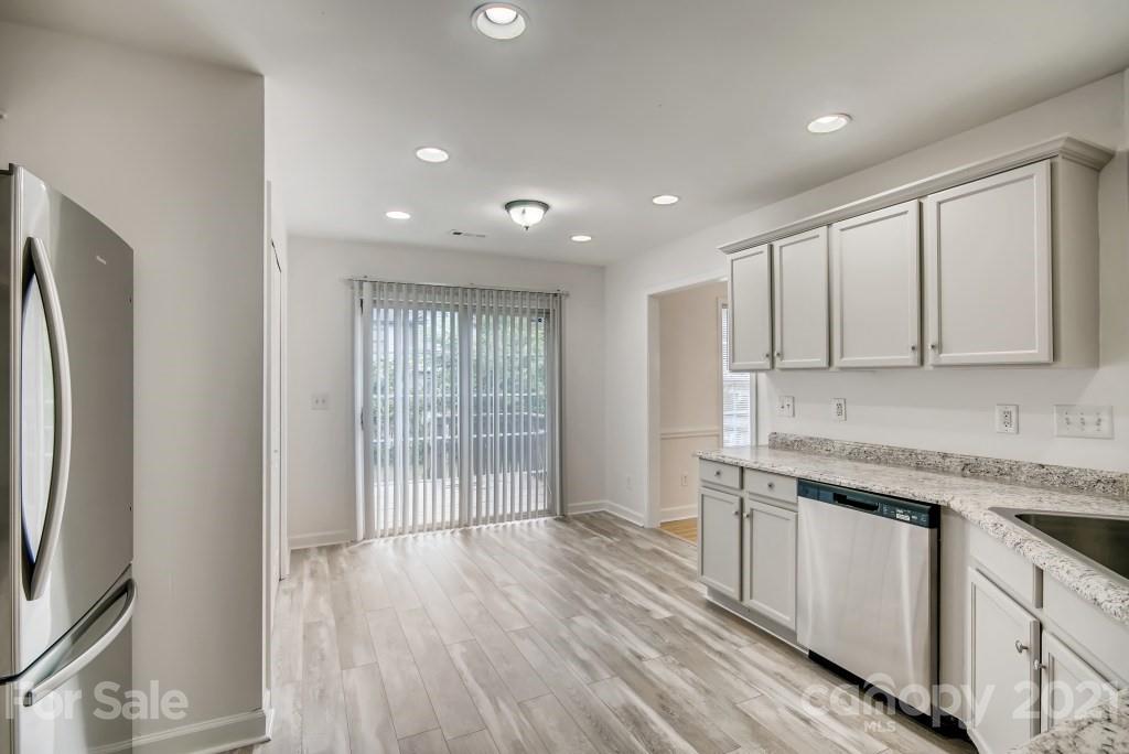1512 Mineral Springs Road Charlotte, NC 28262 - Photo 6 of 19 a view of a kitchen with electric appliances