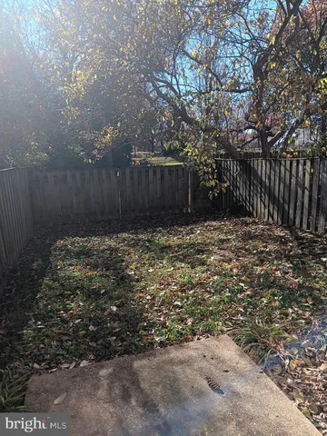 a view of a wooden fence