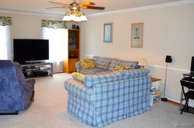 9606 Dunroming Road Chesterfield, VA 23832 - Photo 3 of 19 a living room with furniture and a flat screen tv