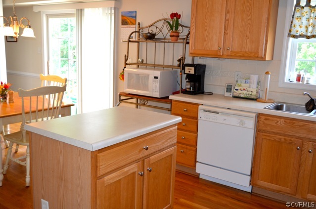 9606 Dunroming Road Chesterfield, VA 23832 - Photo 5 of 19 a kitchen with a sink cabinets and wooden floor
