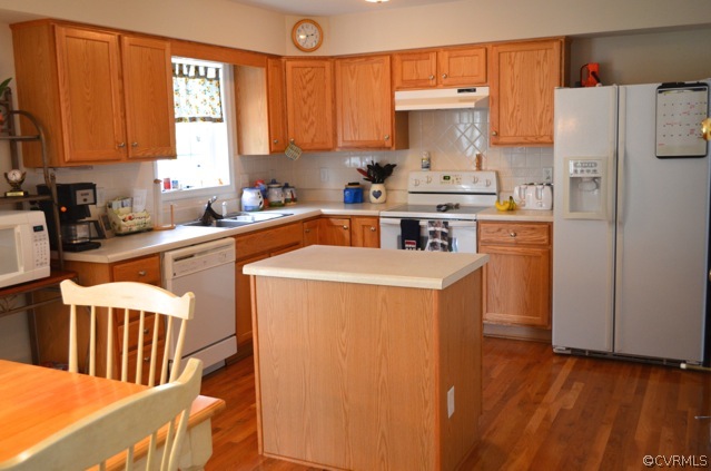 9606 Dunroming Road Chesterfield, VA 23832 - Photo 6 of 19 a kitchen with refrigerator and cabinets