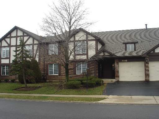 6148 Willowhill Road, Unit B Willowbrook, IL 60527 - Photo 1 of 1 a view of a house with a yard