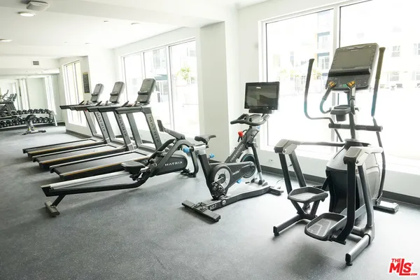 a view of a room with gym equipment