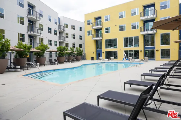 a view of building with outdoor seating