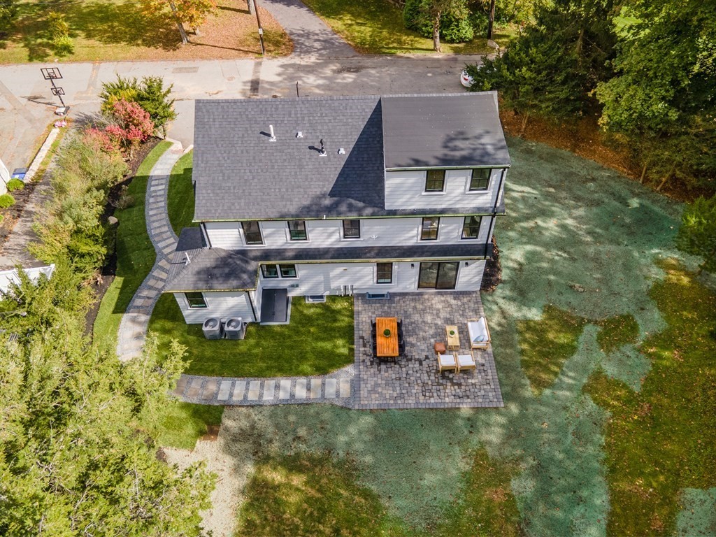 25 Francis Road Wellesley, MA 02482 - Photo 3 of 7 an aerial view of a house with swimming pool and a yard