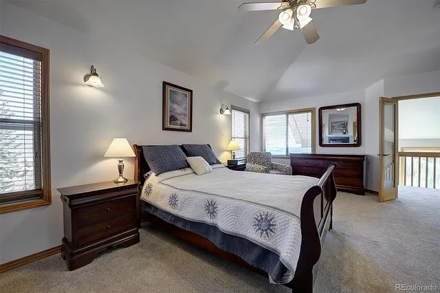 a bathroom with a granite countertop sink mirror and double