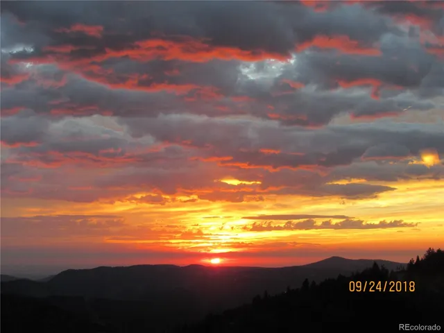 $885,000 | 1295 Hy-Vu Drive, Evergreen, CO 80439