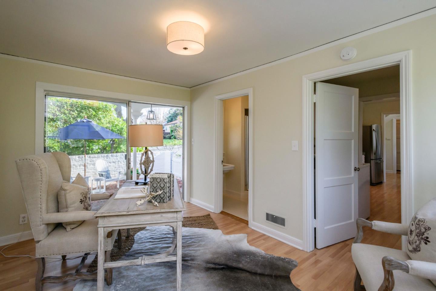 604 Parrott Drive San Mateo, CA 94402 - Photo 11 of 35 a living room with furniture and a large window
