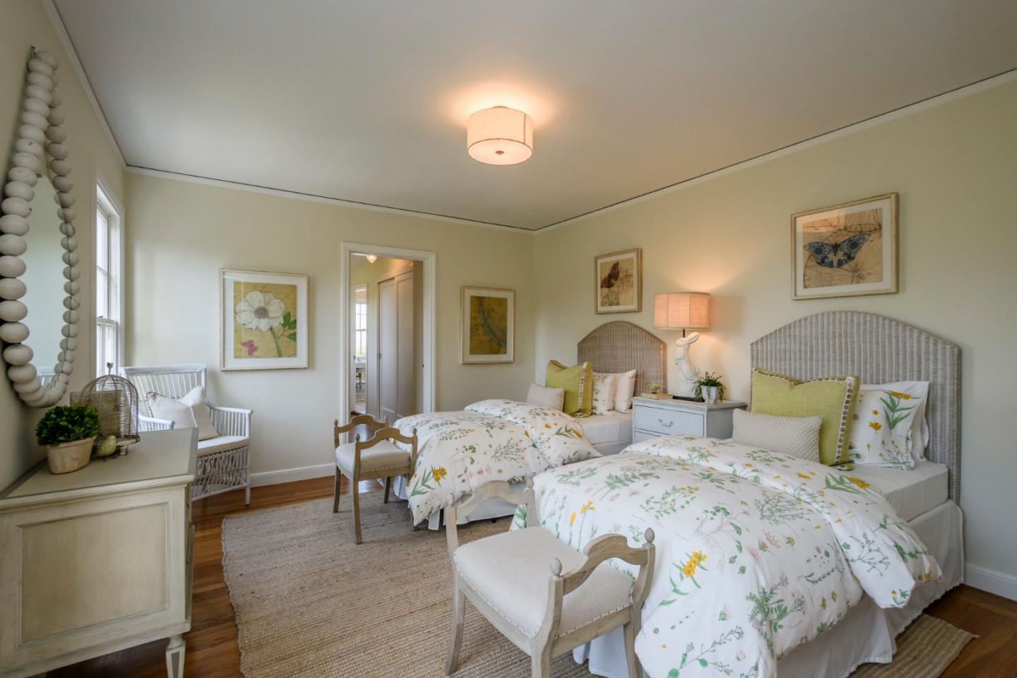 604 Parrott Drive San Mateo, CA 94402 - Photo 15 of 35 a bedroom with a bed and wooden floor