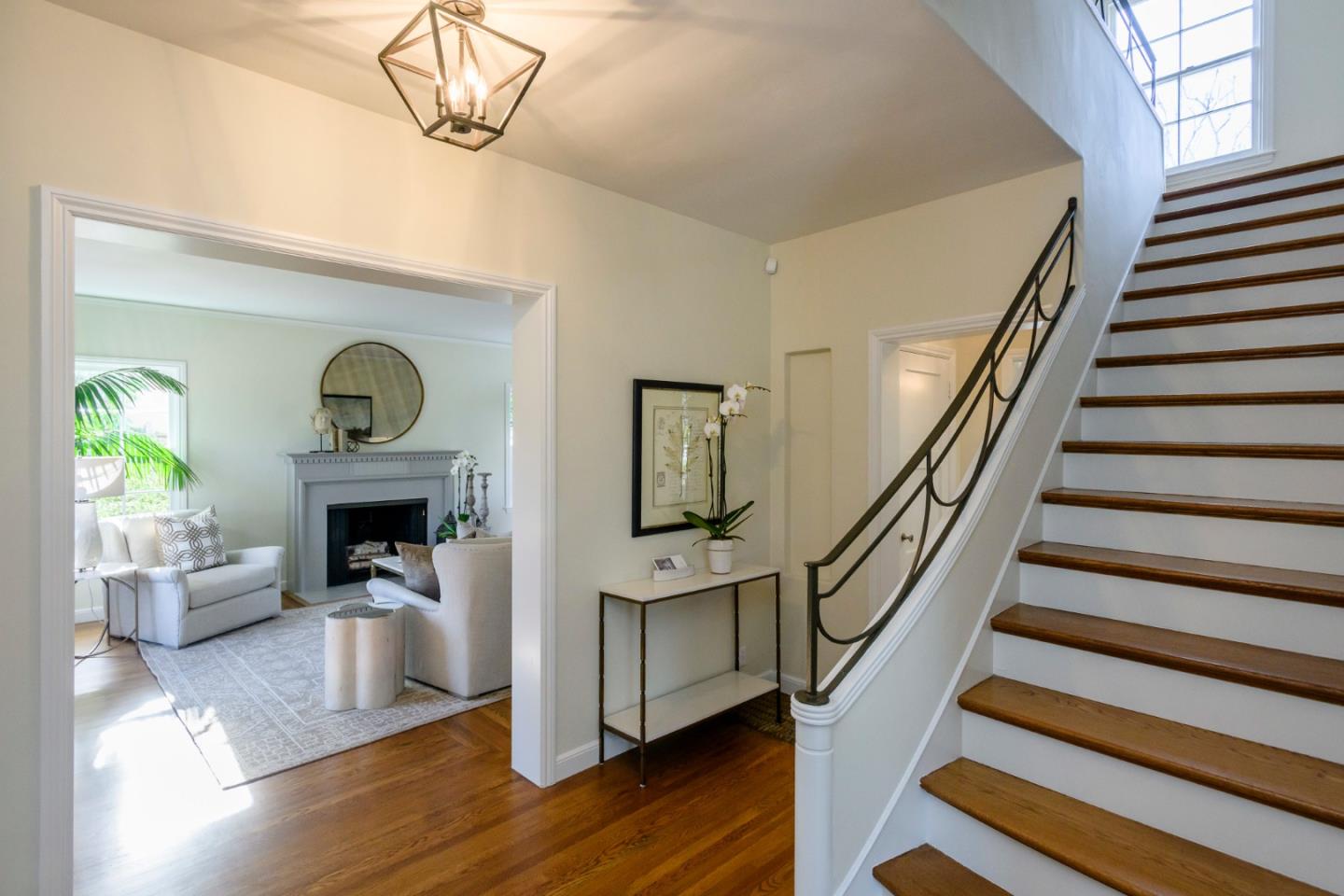 604 Parrott Drive San Mateo, CA 94402 - Photo 2 of 35 a view of a livingroom with furniture entryway wooden floor and a chandelier