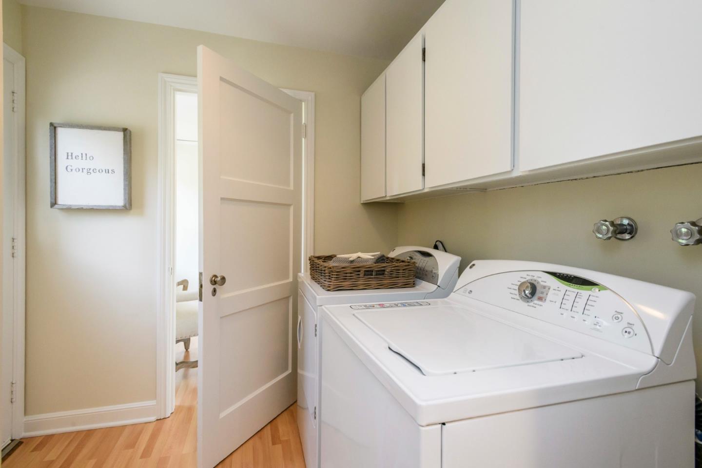 604 Parrott Drive San Mateo, CA 94402 - Photo 24 of 35 a utility room with dryer and washer