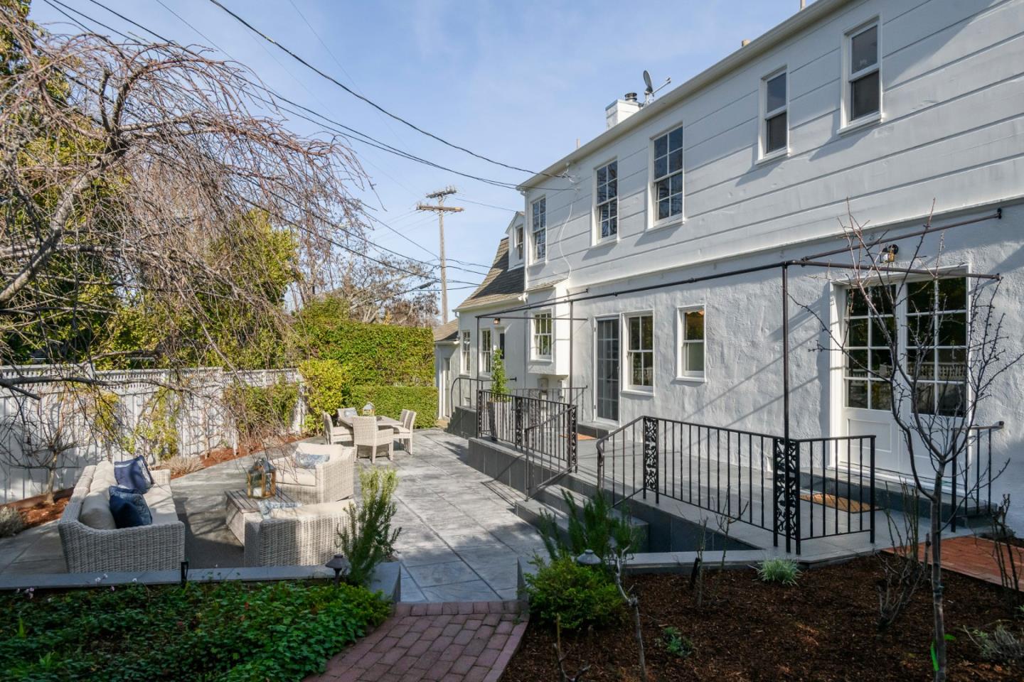 604 Parrott Drive San Mateo, CA 94402 - Photo 30 of 35 a view of a patio with couches table and chairs and potted plants