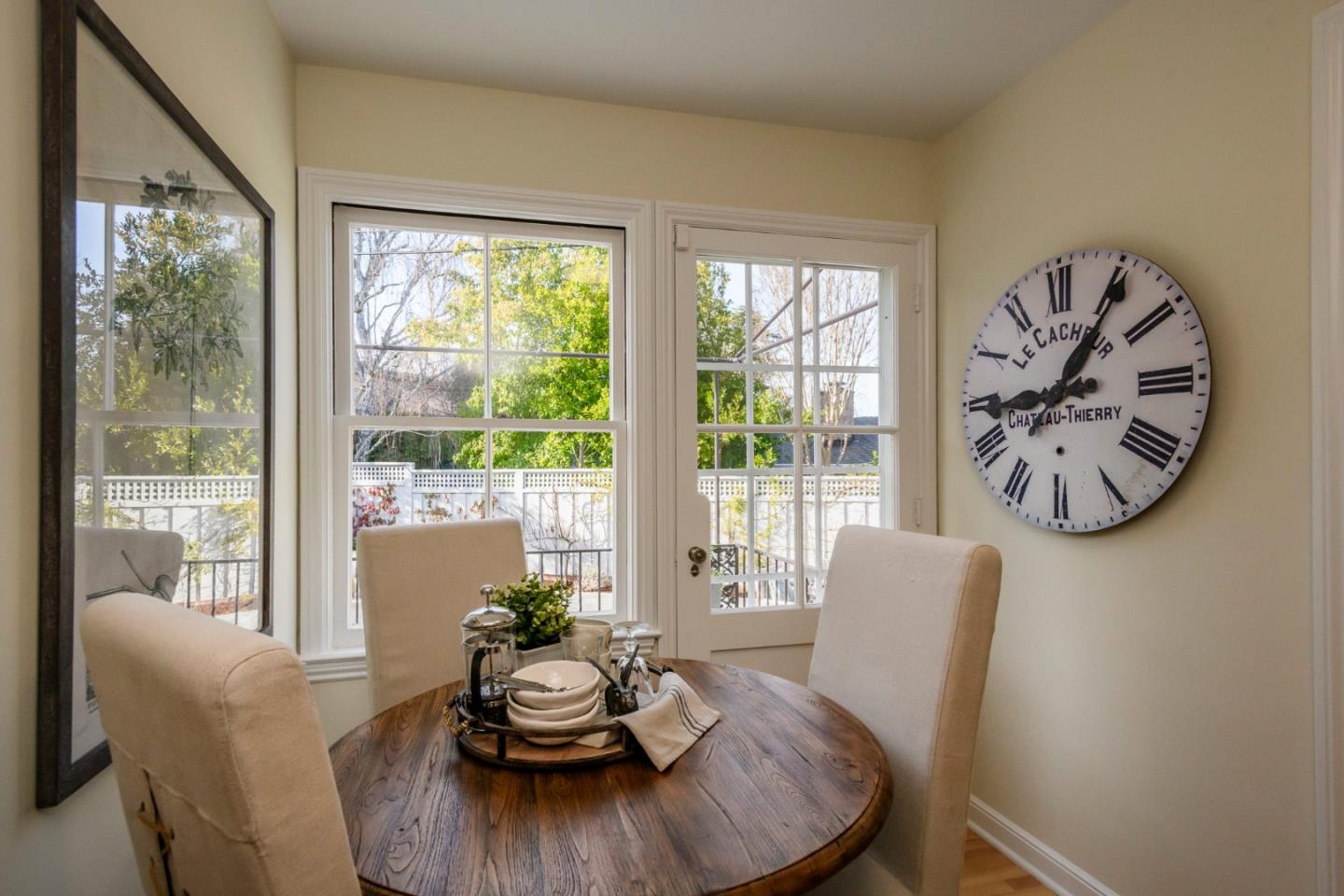 604 Parrott Drive San Mateo, CA 94402 - Photo 7 of 35 a dining room with furniture a rug and a large window