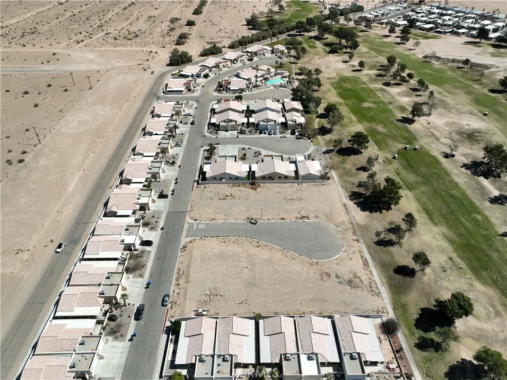 38 Par Blythe, CA 92225 - Photo 4 of 10 an aerial view of multi story residential apartment building with yard