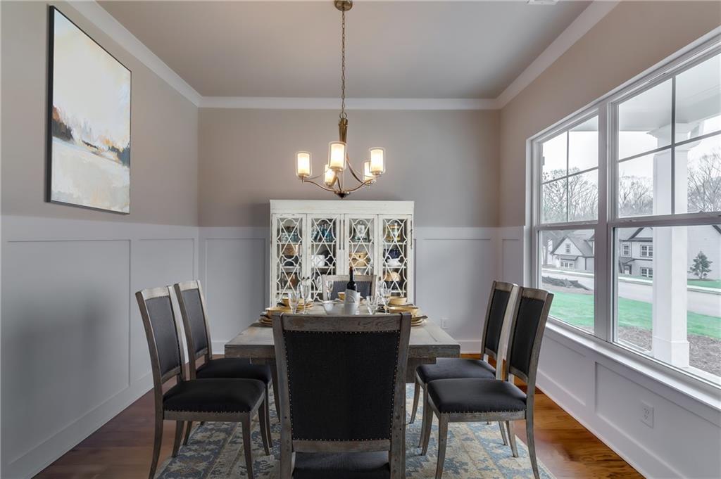 12 Overview Court Hoschton, GA 30548 - Photo 3 of 18 a view of a dining room with furniture window and outside view