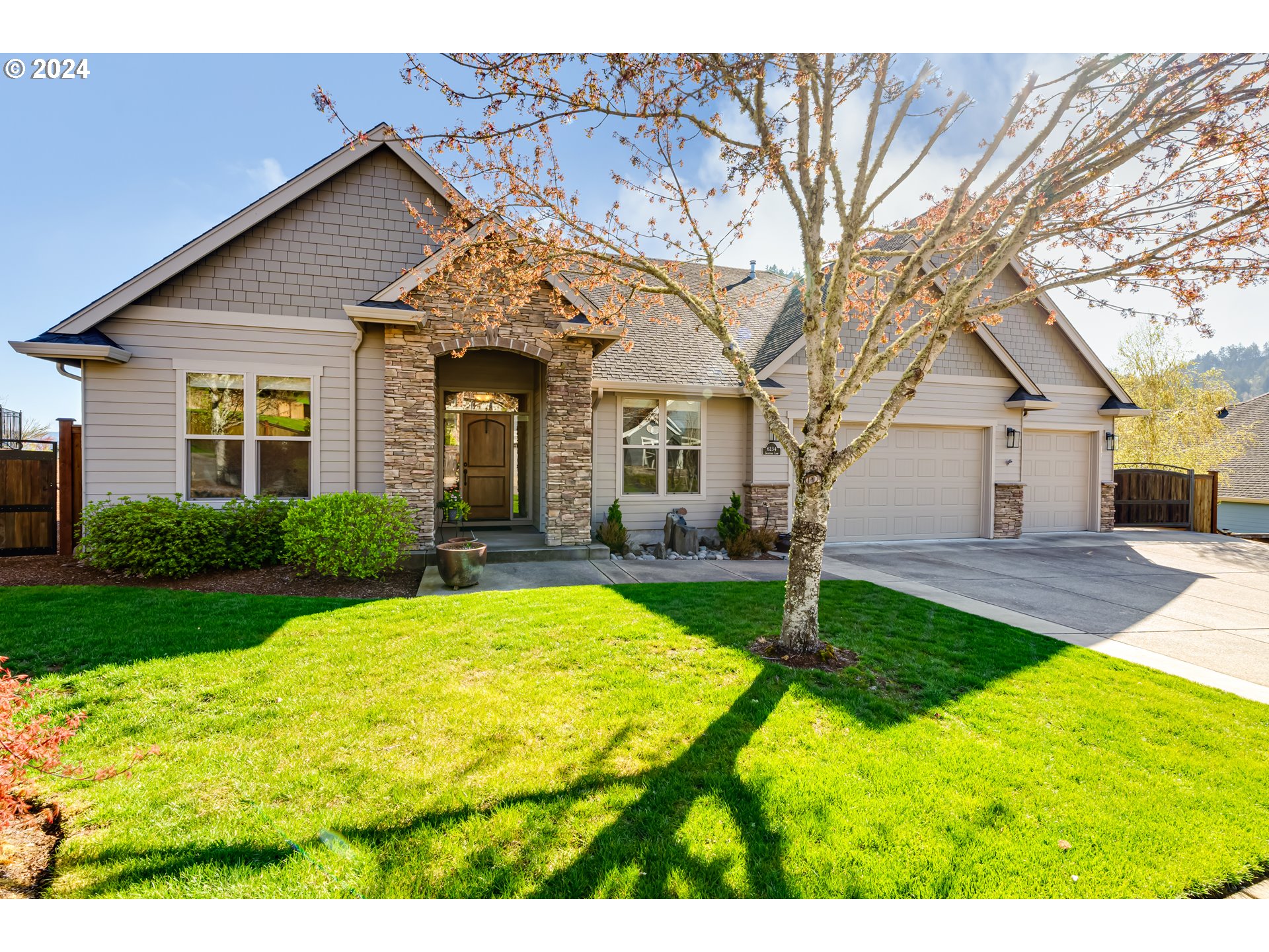 6234 Graystone Loop Springfield, OR 97478 - Photo 1 of 43 a view of a house with swimming pool