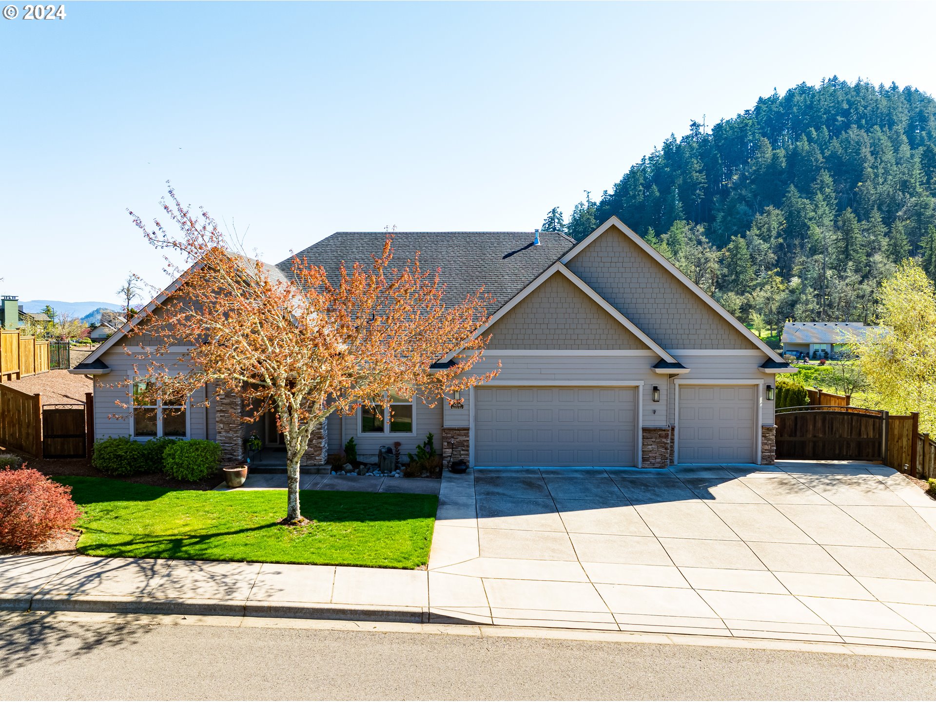 6234 Graystone Loop Springfield, OR 97478 - Photo 2 of 43 a view of house and tree in front of it