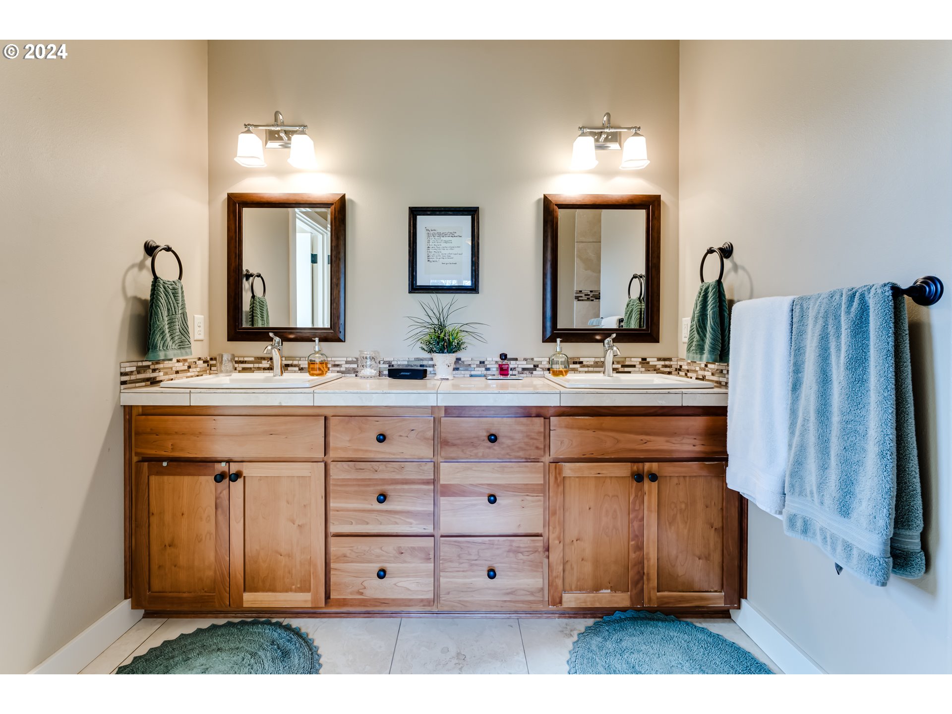 6234 Graystone Loop Springfield, OR 97478 - Photo 27 of 43 a bathroom with a sink and a mirror