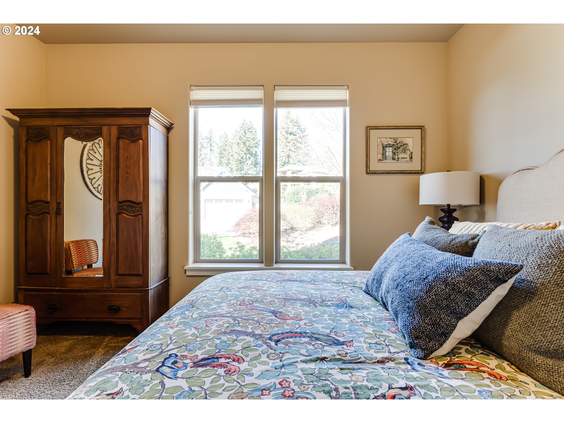 6234 Graystone Loop Springfield, OR 97478 - Photo 30 of 43 a bedroom with a large bed and a window