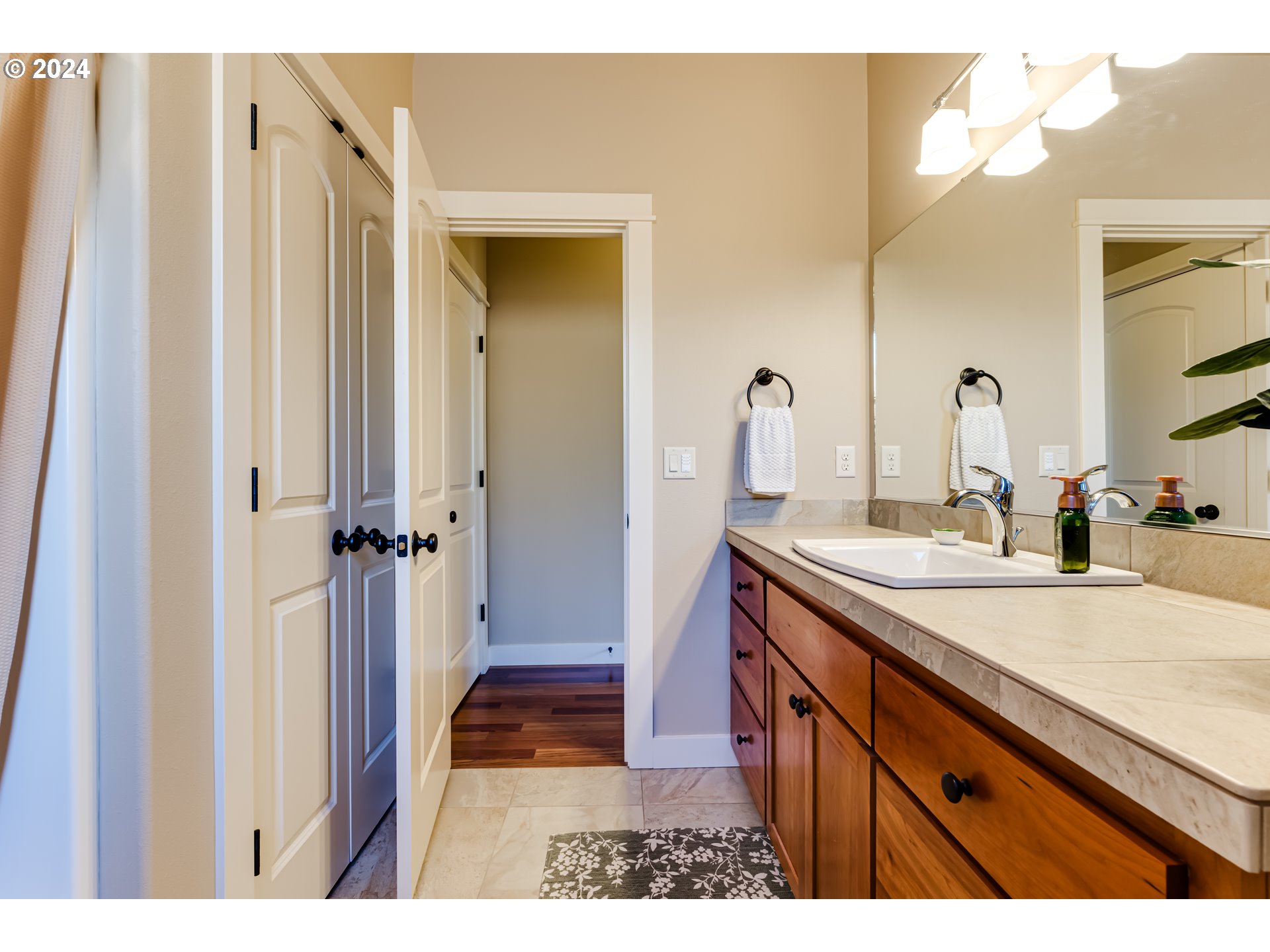 6234 Graystone Loop Springfield, OR 97478 - Photo 32 of 43 a bathroom with a sink and a mirror