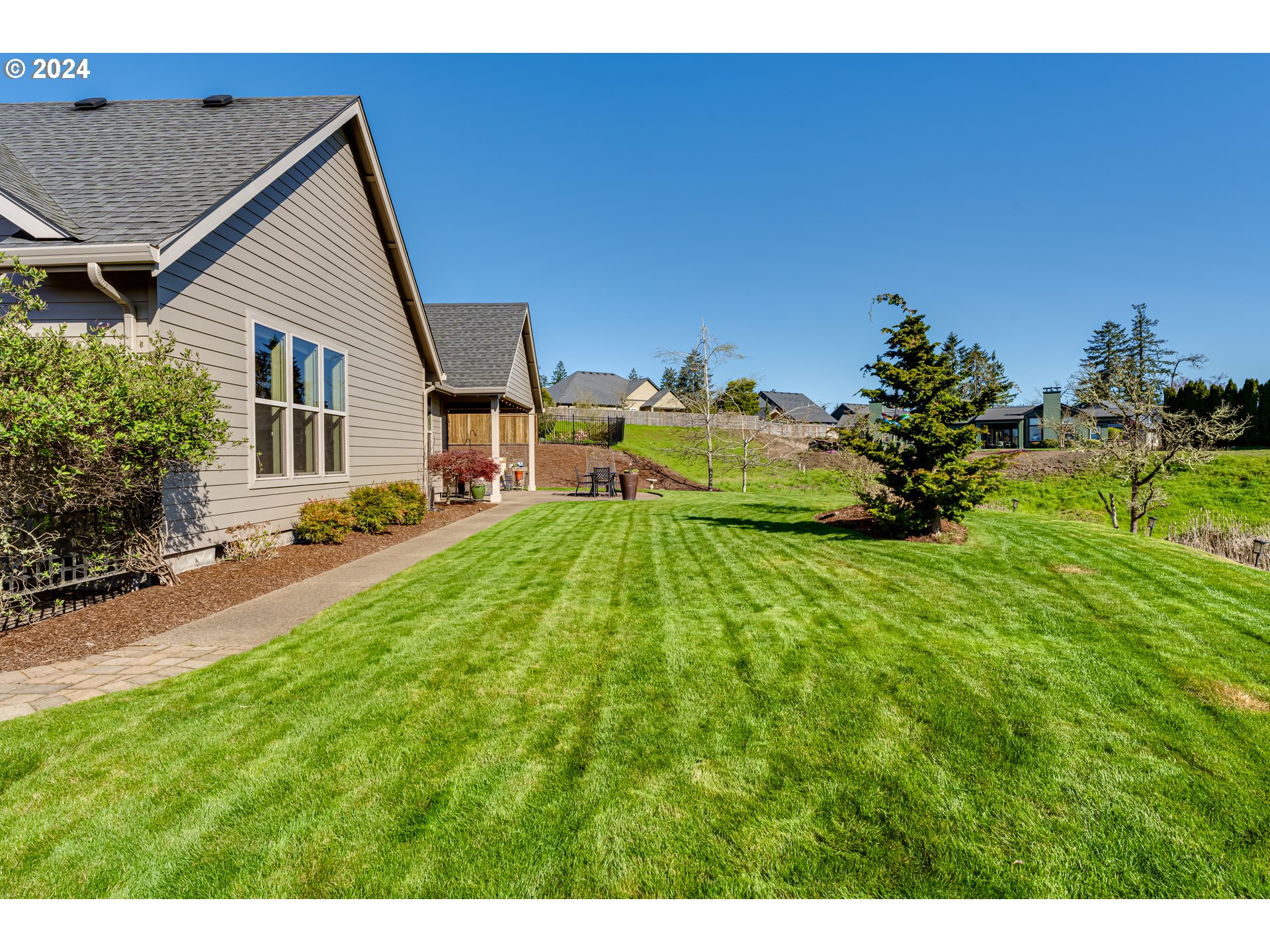 6234 Graystone Loop Springfield, OR 97478 - Photo 36 of 43 a front view of a house with a yard