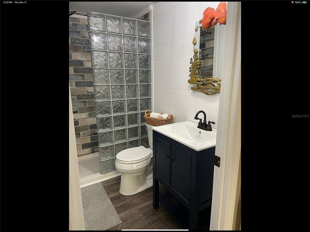 90 Whipporwill Court Ellenton, FL 34222 - Photo 16 of 34 a bathroom with a sink toilet and shower
