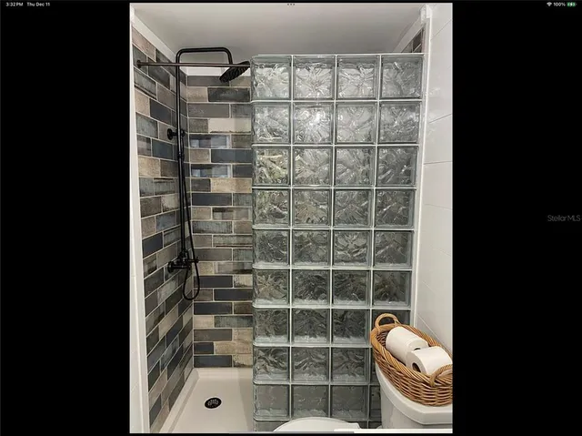 a kitchen with a stove and a microwave