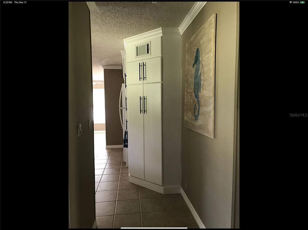 90 Whipporwill Court Ellenton, FL 34222 - Photo 18 of 34 a view of a bathroom from a hallway