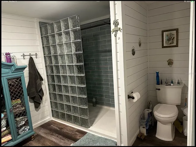 a view of bathroom with a wooden floor