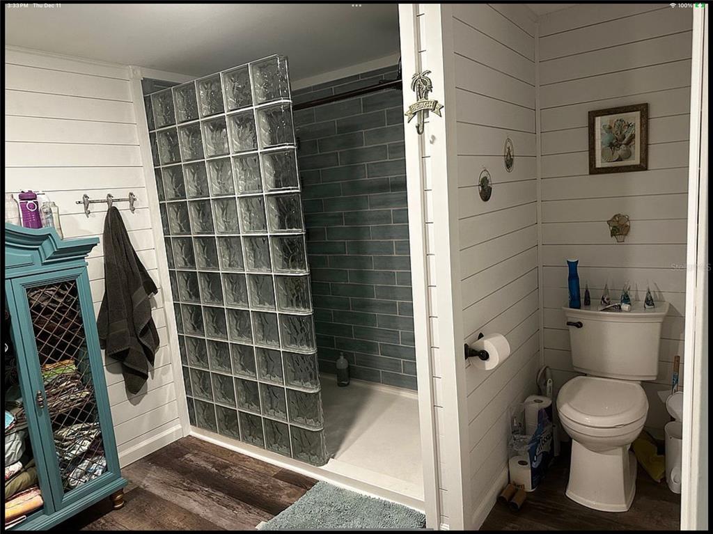 90 Whipporwill Court Ellenton, FL 34222 - Photo 21 of 34 a bathroom with a toilet and a shower