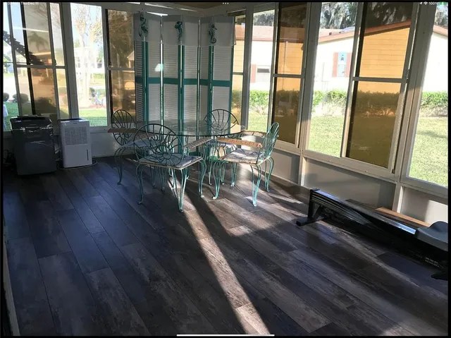 a view of house with a garden