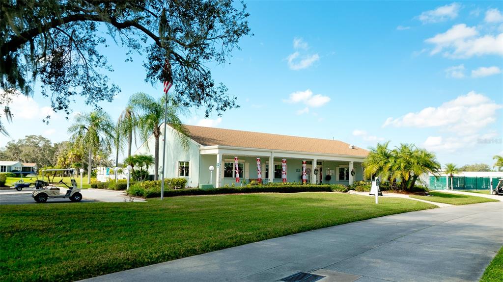 90 Whipporwill Court Ellenton, FL 34222 - Photo 26 of 34 a view of house with a garden